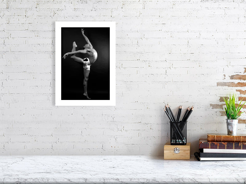 Unframed fine art print of "Sculpted Motion", a powerful monochrome composition showcasing the body's sculptural elegance.