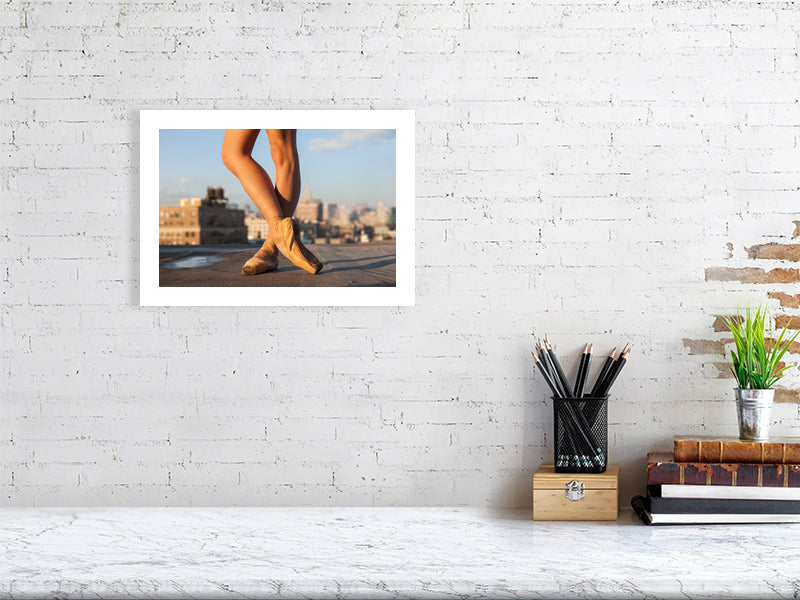 Unframed fine art print of "Urban En Pointe", an evocative dance piece celebrating strength and grace.