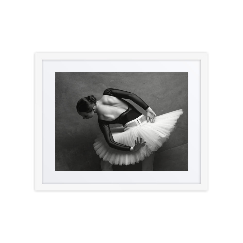 A ballerina captured in a quiet and graceful moment, bending and adjusting her tutu with delicate care. The soft lighting highlights her poised, elegant figure, emphasizing the quiet strength and intimate connection to the art of ballet.