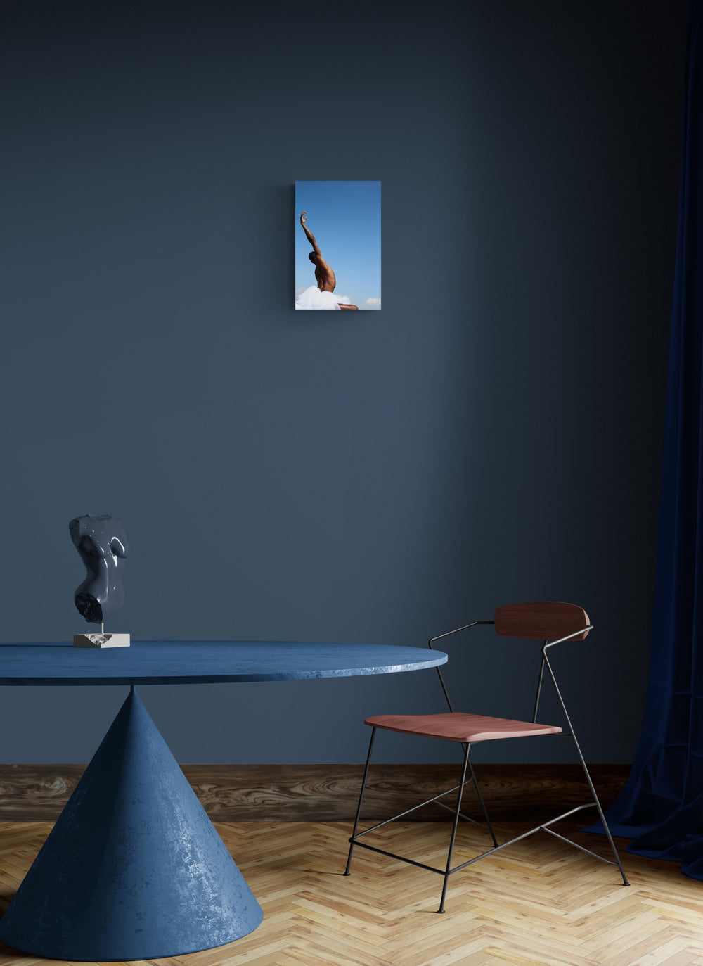 Black male dancing in the nature. His hand is oriented up onto the blue sky. We see him from behind. his armpit is glowing into the sunlight. art print on the dinning room wall.