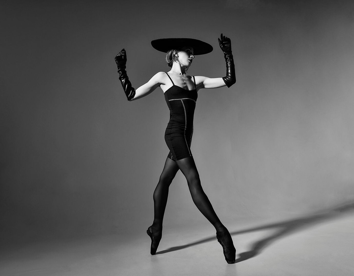 Eclipsed Elegance — fine art dance photograph, dramatic interplay of light and shadow. Dance Artworks Gallery.