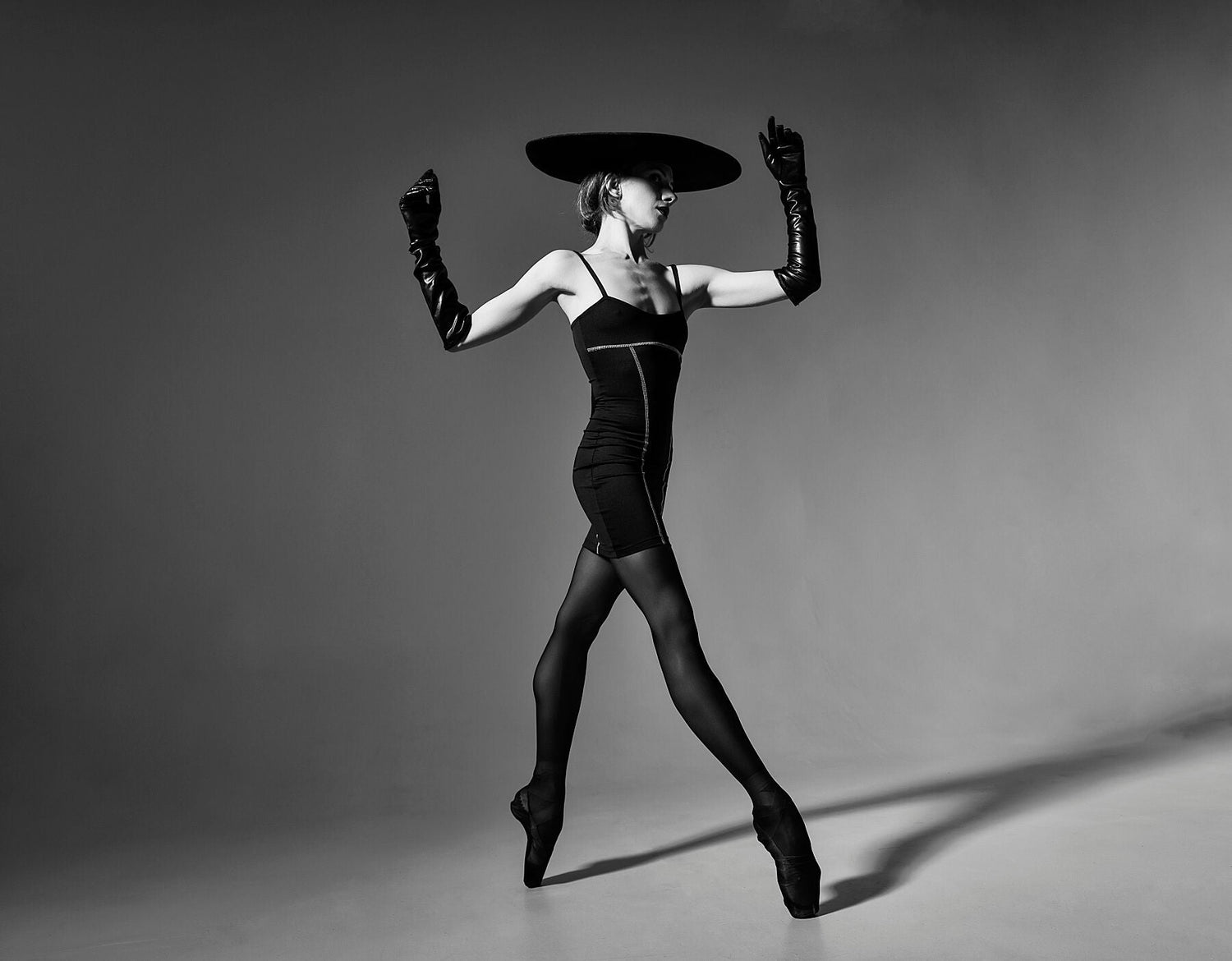 Eclipsed Elegance — fine art dance photograph, dramatic interplay of light and shadow. Dance Artworks Gallery.