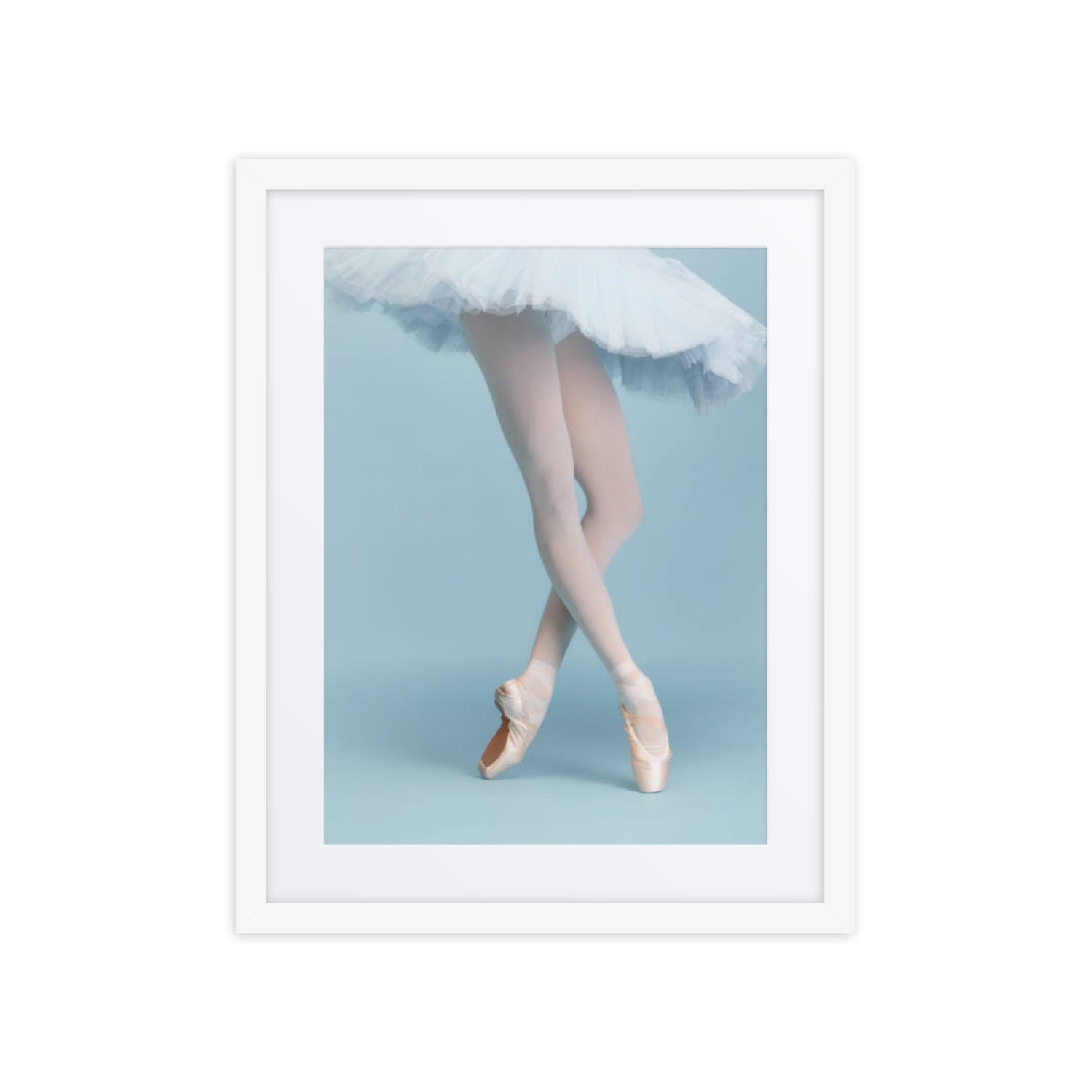 Delicate Rise dance framed poster from the Fine Art Dance Framed Posters Collection, featuring a ballerina's graceful pointe pose in a classic white frame, perfect for elegant home decor or as a meaningful gift.