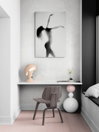 Minimal black-and-white dance silhouette, Silhouette #1 by Cédric Brion, shown as a 90 × 60 cm fine art photograph mounted on aluminium Dibond, installed above a compact desk with a designer chair and lamp.