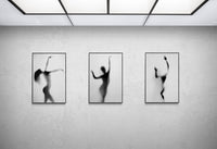 Triptych of black-and-white dance silhouettes by Cédric Brion mounted on aluminium Dibond in Black tray frames, resented on a gallery wall art exhibition.
