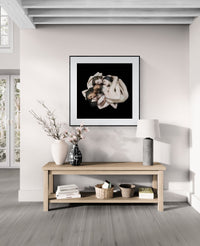 Mock-up showing the UNA Projects limited edition fine art print by Nir Arieli from the FLOCKS series displayed in a modern minimalist interior, framed and hung above a console table.
