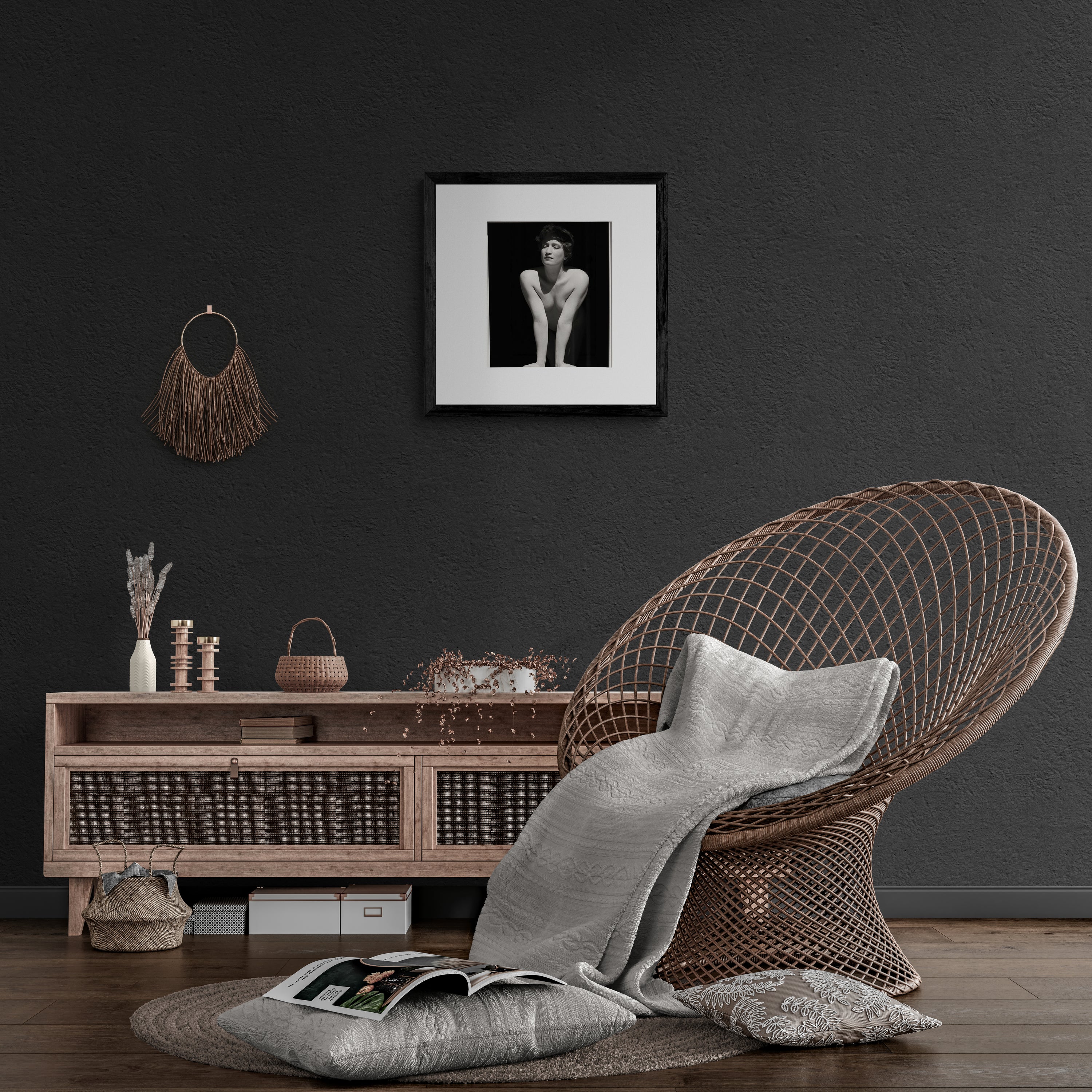 Mockup of At the Window fine art dance print, displayed in a bohemian-style room with a rattan chair, showcasing its versatility and elegance for unique interior decor.