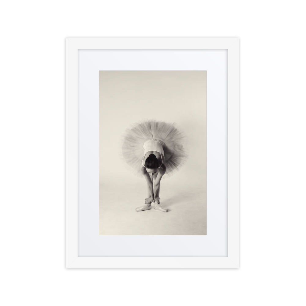 Framed fine art poster titled 'Ballerina Bow,' featuring a ballerina in a classical bowing position, gracefully bending forward. Captured in soft tones, the image evokes elegance and poise, ideal for any art enthusiast or dance lover.