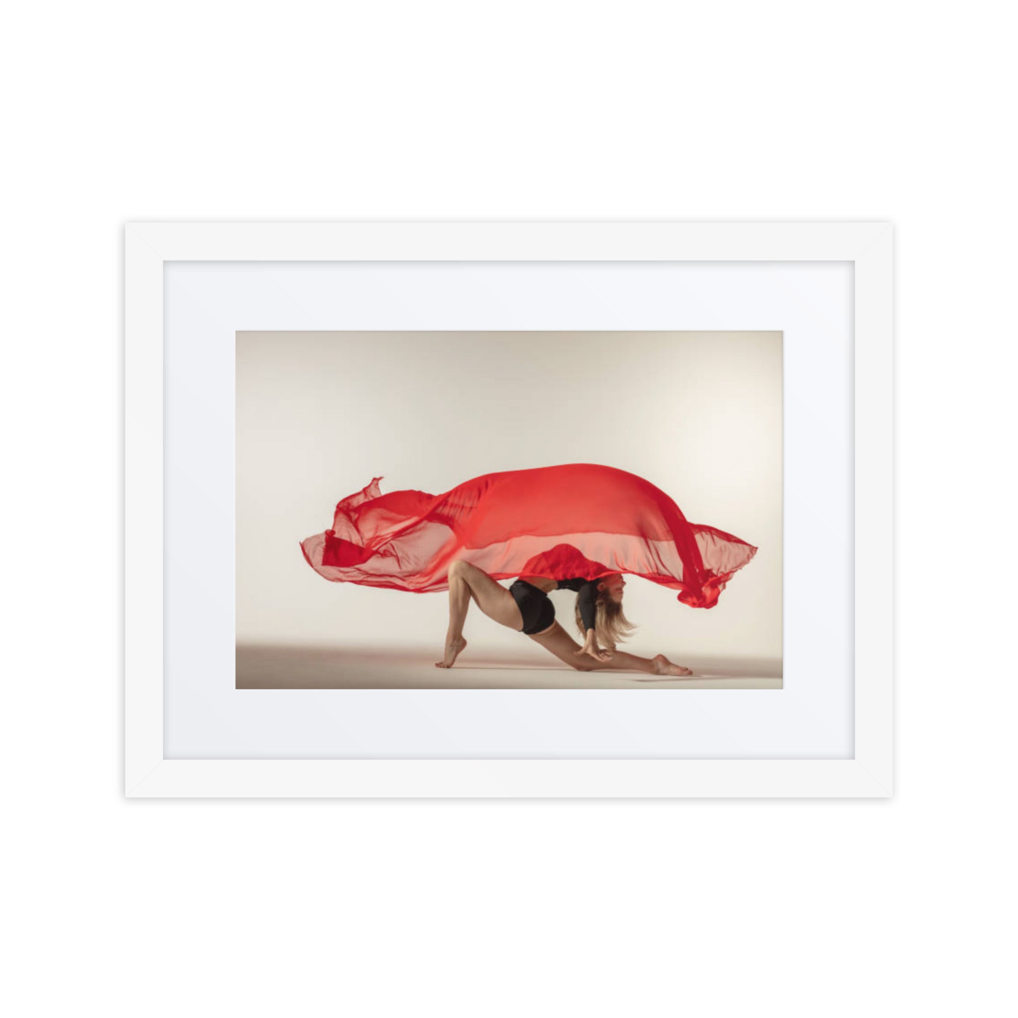 Framed fine art poster titled 'Crimson Grace,' featuring a dancer in an elegant pose, draped in flowing crimson fabric. The bold red accent against a soft background creates a powerful yet graceful visual impact, perfect for any modern or classic space.