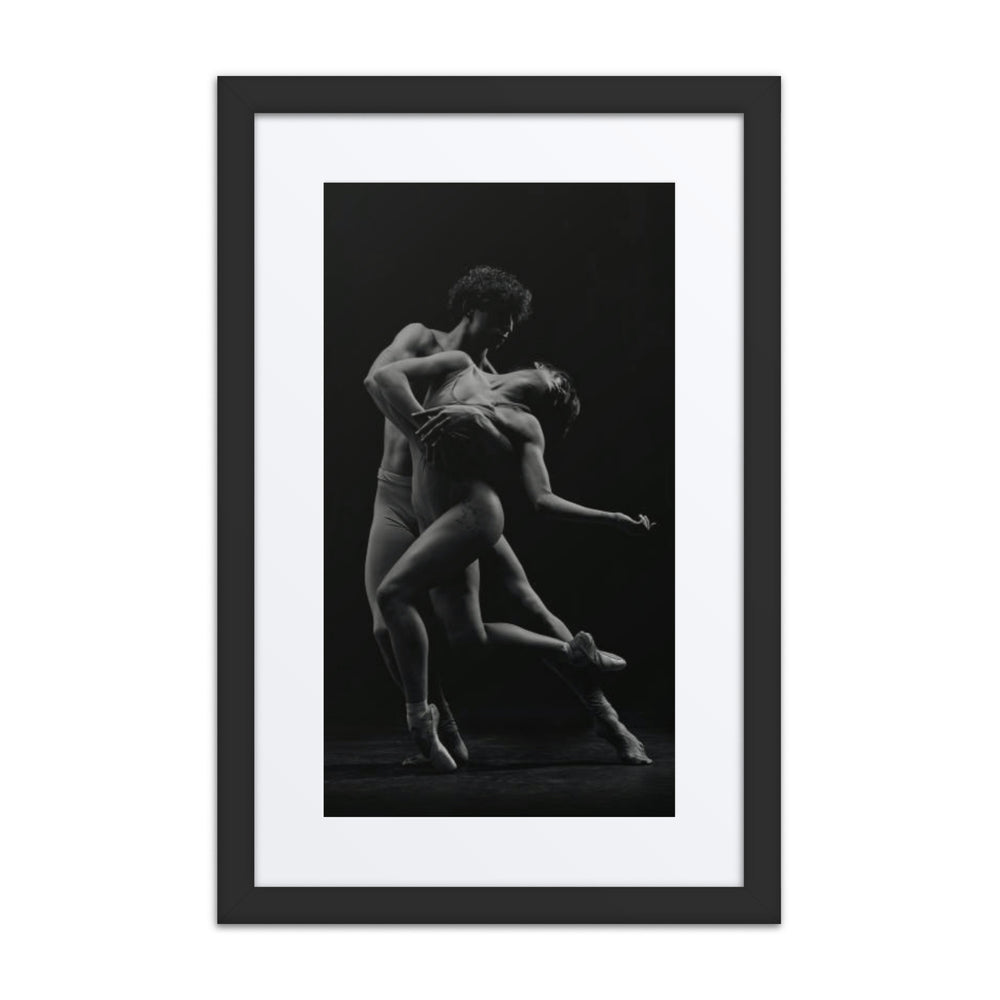 A striking image of two dancers locked in a seamless duet, expressing connection and artistry through their poised and fluid movements.