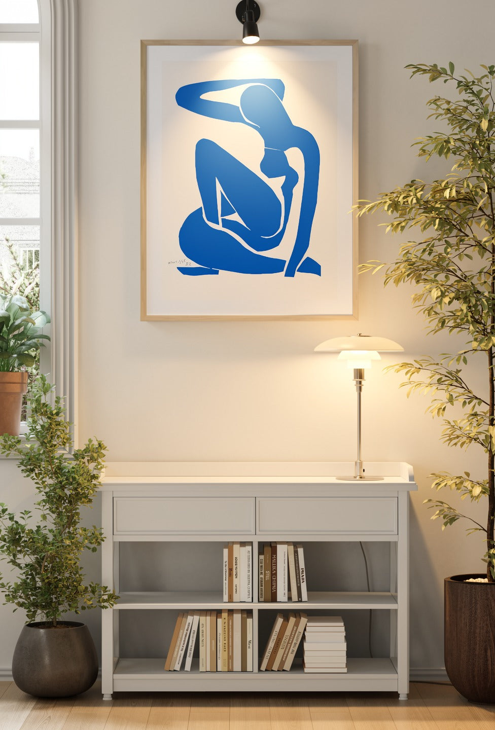 Henri Matisse Nu Bleu I (Blue Nude I), 2007, natural oak frame above a console in a contemporary interior.