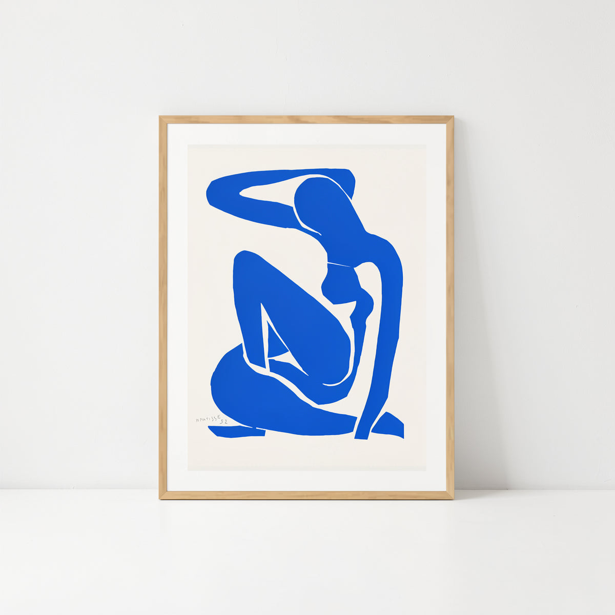 Henri Matisse Nu Bleu I (Blue Nude I), 2007, natural oak frame shown frontally on a white background.