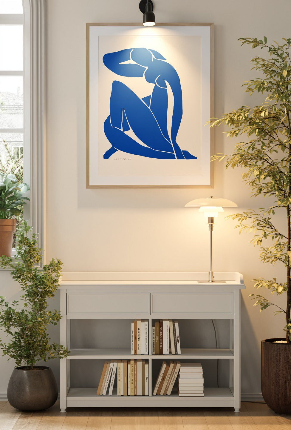 Henri Matisse Nu Bleu II (Blue Nude II), 2007, natural oak frame above a console in a contemporary interior.