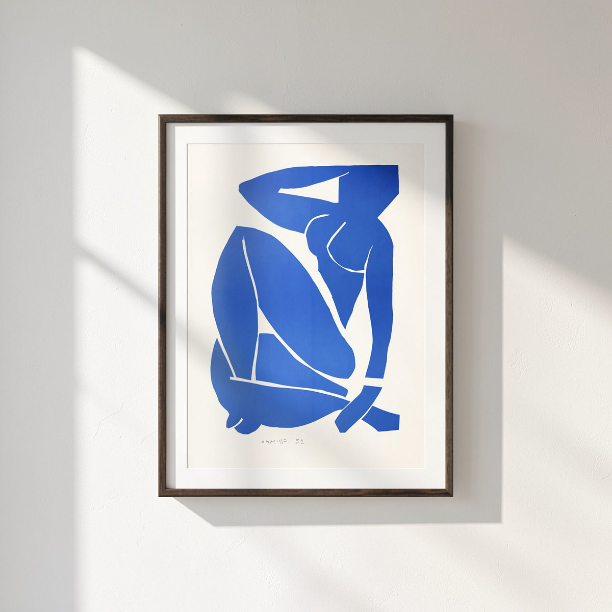 Henri Matisse Nu Bleu III (Blue Nude III), 2007, Museum Black framed presentation on a sunlit white wall.