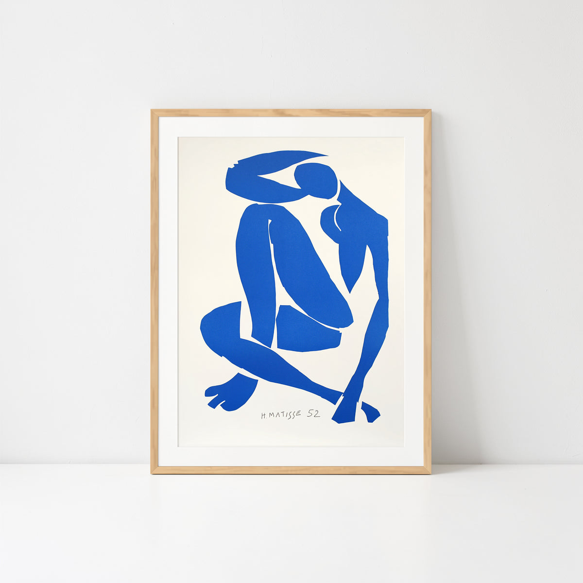 Henri Matisse Nu Bleu IV (Blue Nude IV), 2007, shown frontally in a Natural Oak frame.