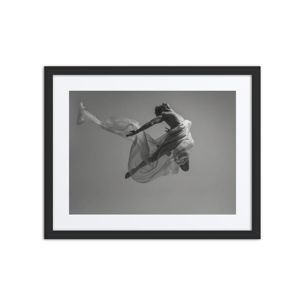 A dancer suspended mid-leap, captured in a dynamic moment of powerful movement. The flowing fabric envelops the dancer, highlighting the intensity and freedom of the performance. The image radiates strength and liberation, emphasizing a breakthrough in both form and expression.