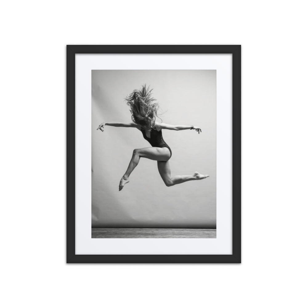 A dancer caught mid-air in a graceful and powerful leap, her body suspended in motion. The minimalist background accentuates the energy of the jump, with her flowing hair and poised posture evoking a sense of freedom and quiet strength.