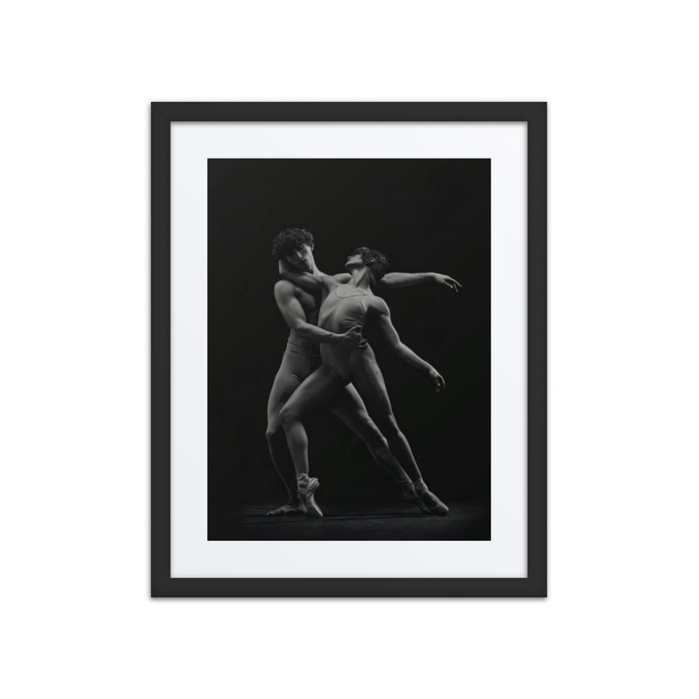 A powerful portrayal of two dancers in an intimate, dynamic pose, expressing the perfect balance of contrast and connection. The dancers’ synchronized movements reflect the duality of strength and grace, captured in monochrome tones that emphasize the raw emotion and elegance of their collaboration.