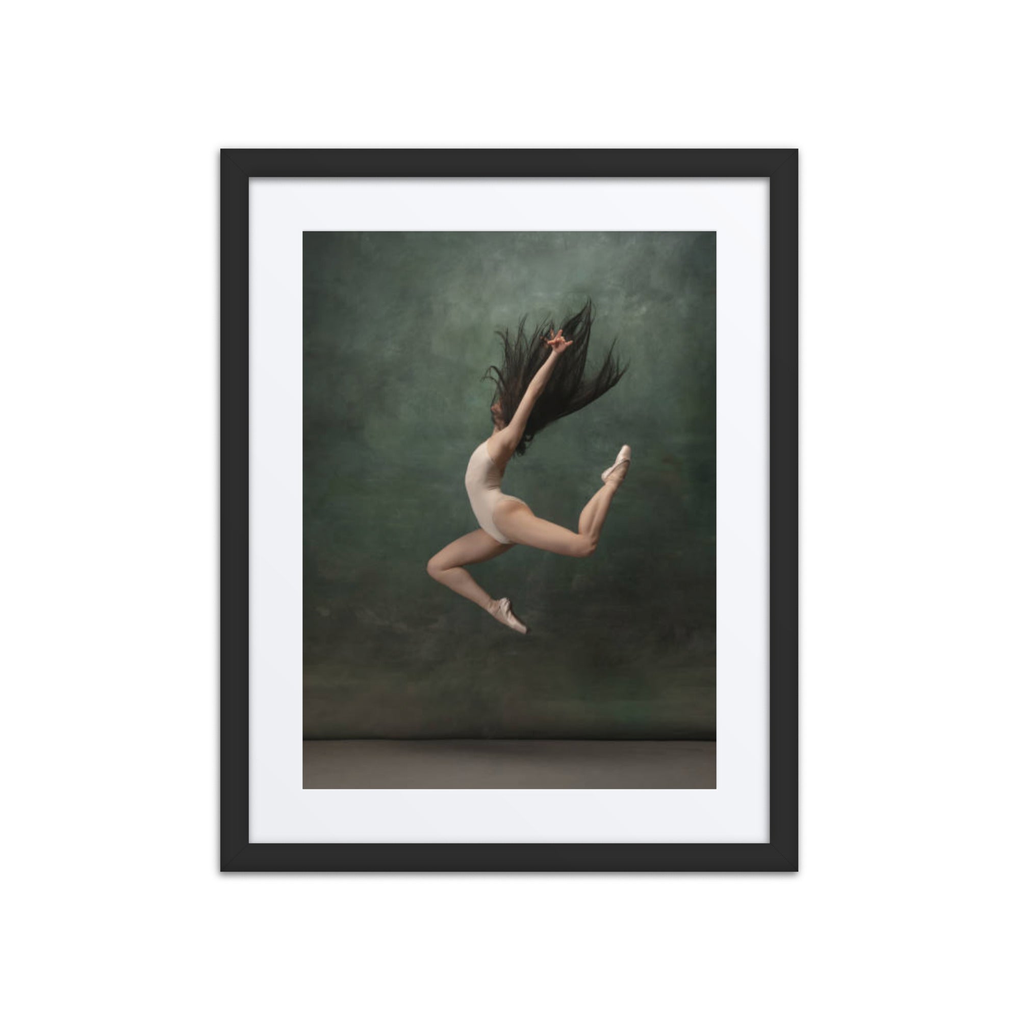 A dynamic image of a ballerina mid-leap in a white leotard against a rich green textured background. Her hair flows dramatically, adding a sense of movement and freedom to the composition. This artwork captures the essence of strength, elegance, and airborne beauty.