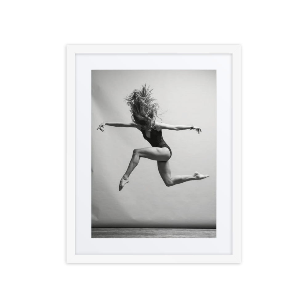 A dancer caught mid-air in a graceful and powerful leap, her body suspended in motion. The minimalist background accentuates the energy of the jump, with her flowing hair and poised posture evoking a sense of freedom and quiet strength.