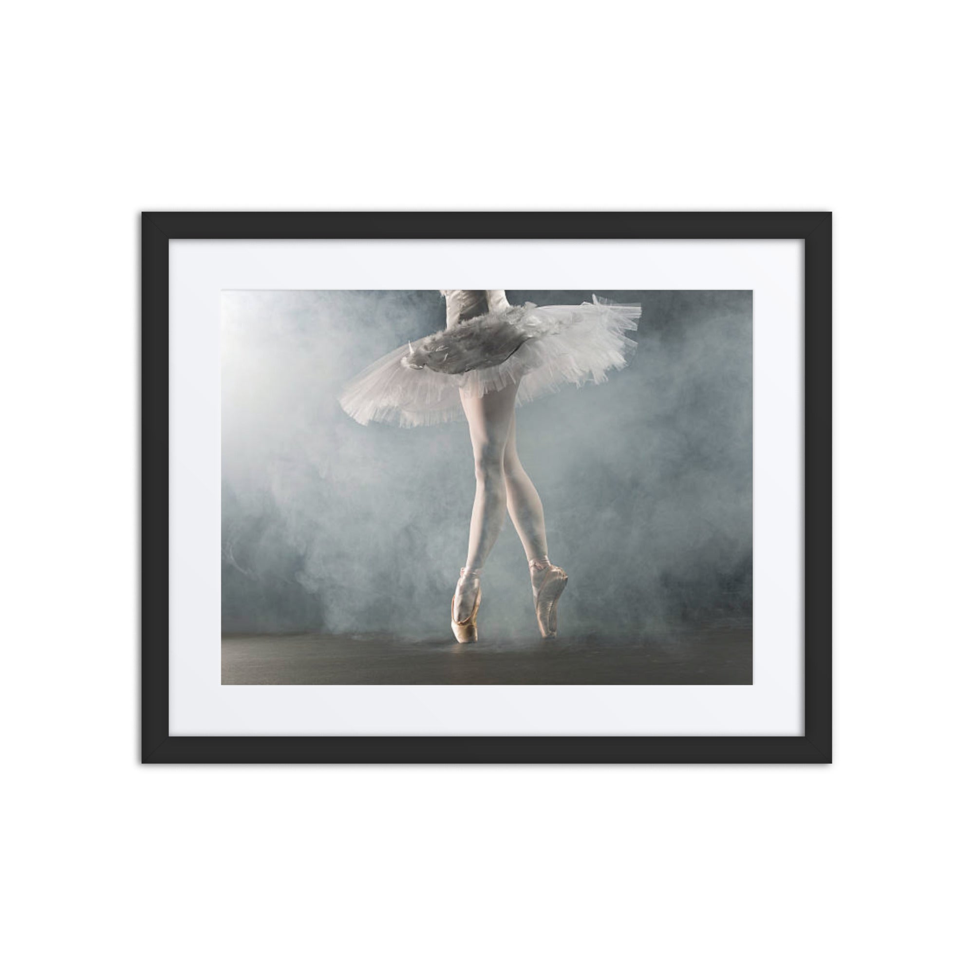 The refined silhouette of a ballerina's legs poised en pointe, enveloped in a soft haze, evoking the serene beauty of ballet.