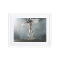 The refined silhouette of a ballerina's legs poised en pointe, enveloped in a soft haze, evoking the serene beauty of ballet.