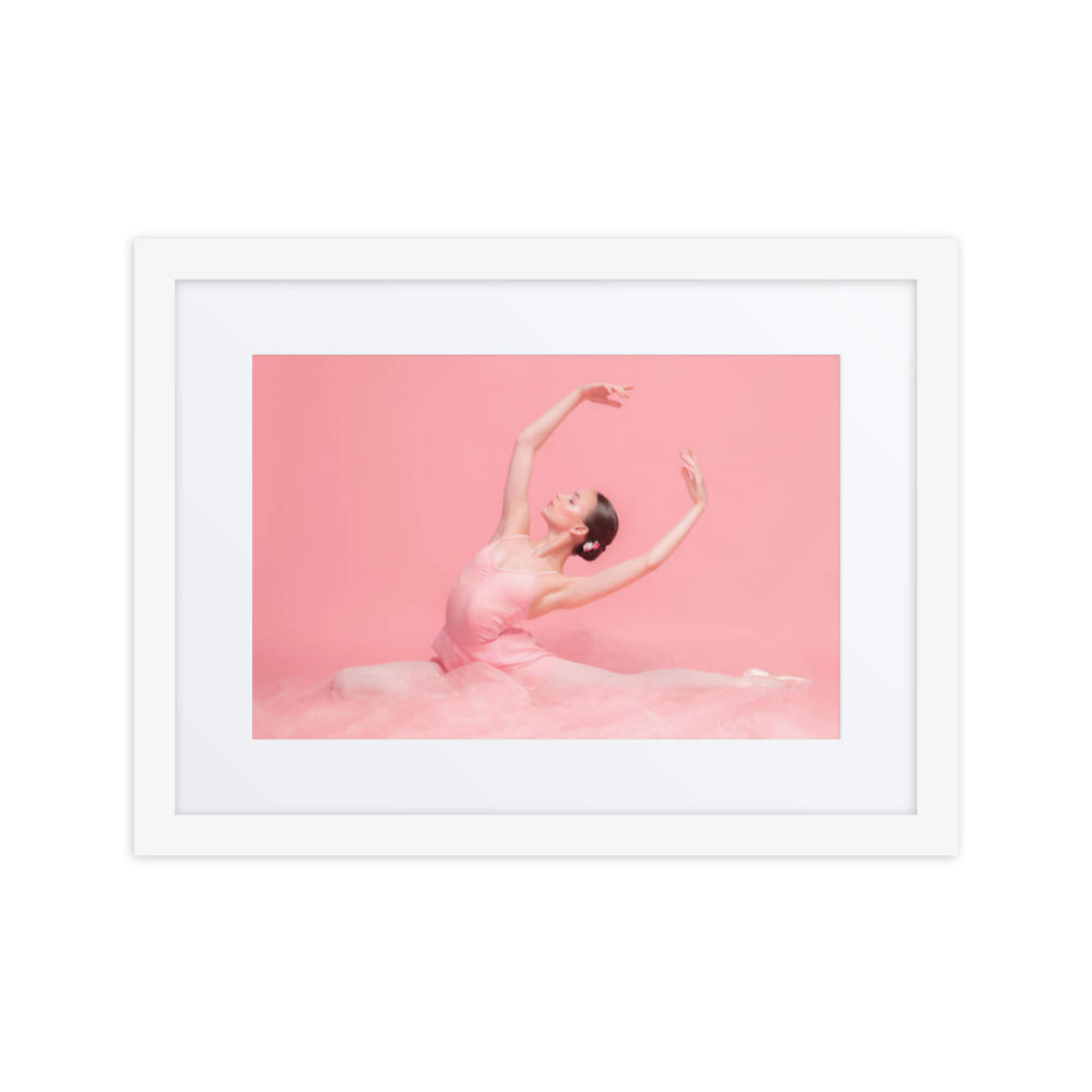 A radiant image of a ballerina in a soft pink tutu and pointe shoes, striking a graceful pose against a pastel pink background, embodying elegance and poise.