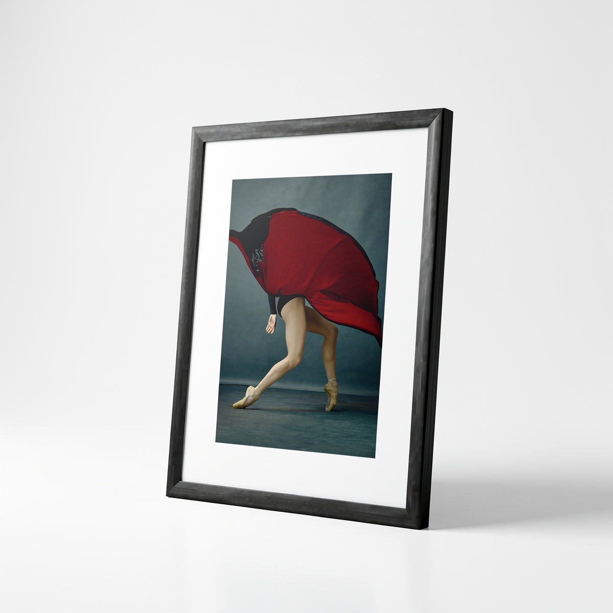 Red Skirt by Sasha Onyshchenko in a black frame, shown at an angle against a light studio background.