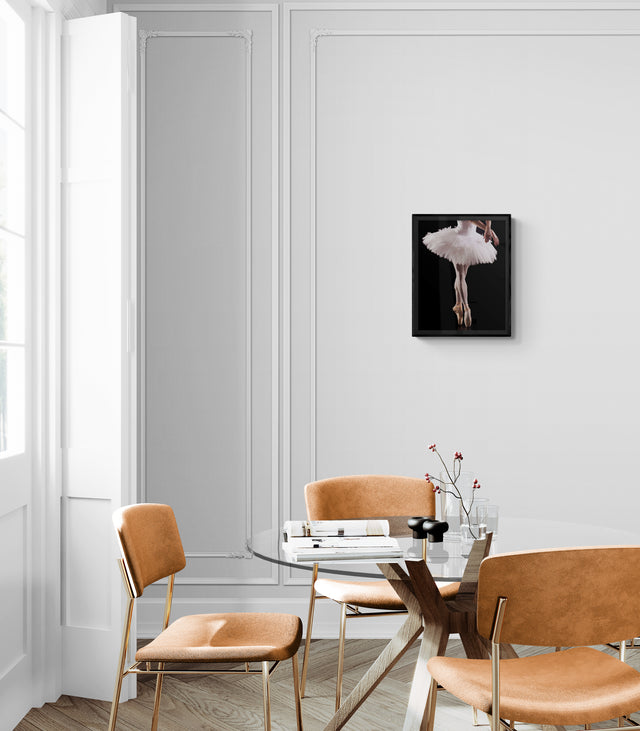 A contemporary interior with framed dance photography. The artwork adds clarity and sculptural movement, creating a refined wall art statement for modern homes.