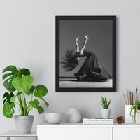 Black framed print of a photograph in black and white representing a female dancer dancing flamenco