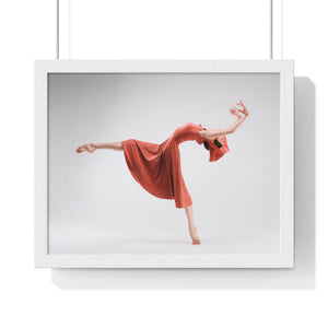 Ballerina performing a movement of contemporary ballet in a orange dress