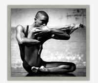 Framed Art Print with a Close-up of a male dancer's face during a performance, showing intense focus and emotion.