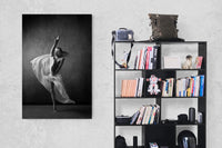 Dancing, ballerina, sexy, movement, flexibility, legs, black and white, dance photography. Art print on the wall close to a bookshelf.